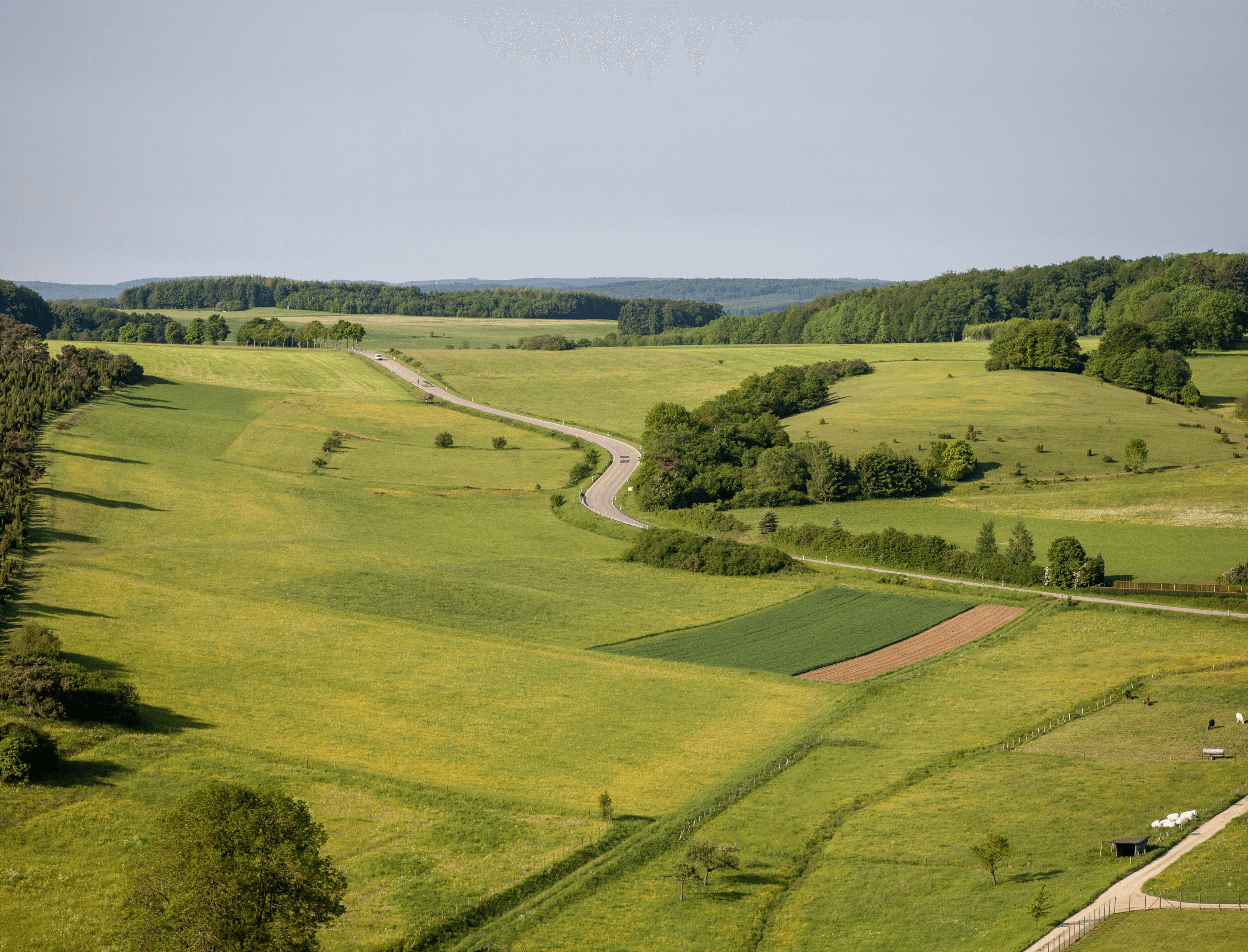 aerial-shot-farmland-clear-sky-eifel-region-germany (1) 1@1.5x